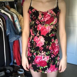 Black dress with flower designs.